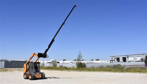 skid steer teleboom attachment|boom attachment for skid steer.